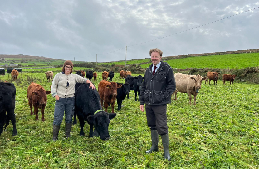 Derek with a cow